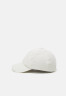 Tommy Hilfiger ICONIC MONOGRAM Cap weathered white ИКОНИЧЕСКАЯ МОНОГРАММА Кепка выветрившийся белый