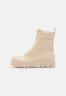 Tommy Hilfiger LACE UP ZIP BOOT MONOGRAM Platform ankle boots sugarcane LACE UP ZIP BOOT MONOGRAM Ботильоны на платформе сахарный тростник