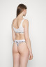 Tommy Hilfiger Thong  white  white Стринги белый белый