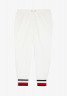 Tommy Hilfiger ADAPTIVE HERITAGE JOGGERS Tracksuit bottoms optic white th ДЖОГГЕРЫ ADAPTIVE HERITAGE Спортивные штаны оптический белый th